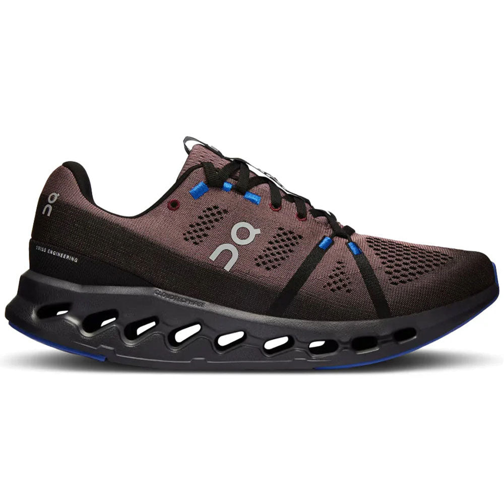 Side view on white background of Womens On Cloudsurfer running shoe in Black/Cobalt, Medium (Regular) width