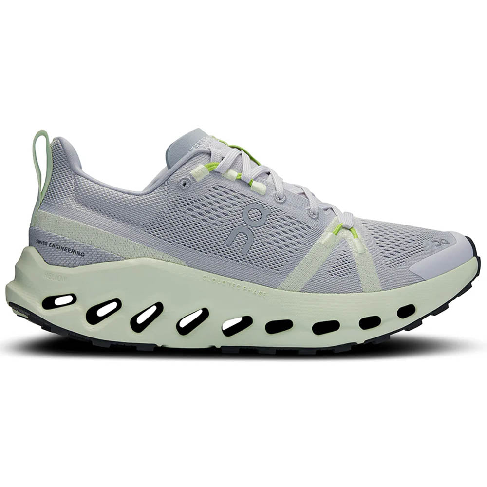 Side view on white background of Womens On Cloudsurfer Trail running shoe in Frost/Lima, Medium (Regular) width