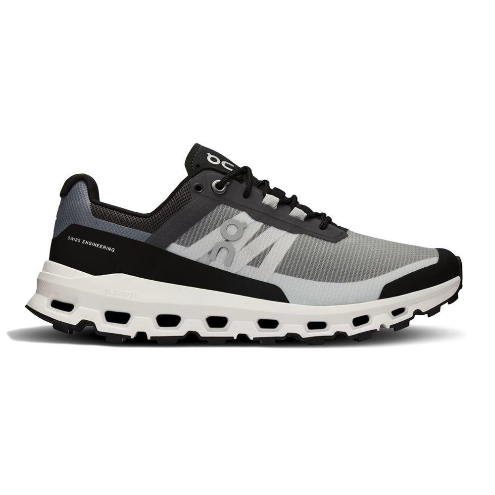 Side view on white background of Womens On Cloudvista running shoe in Black/White, Medium (Regular) width