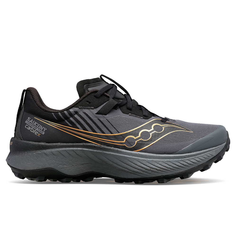 Side view on white background of Womens Saucony Endorphin Edge running shoe in Black/Goldstk, Medium (Regular) width