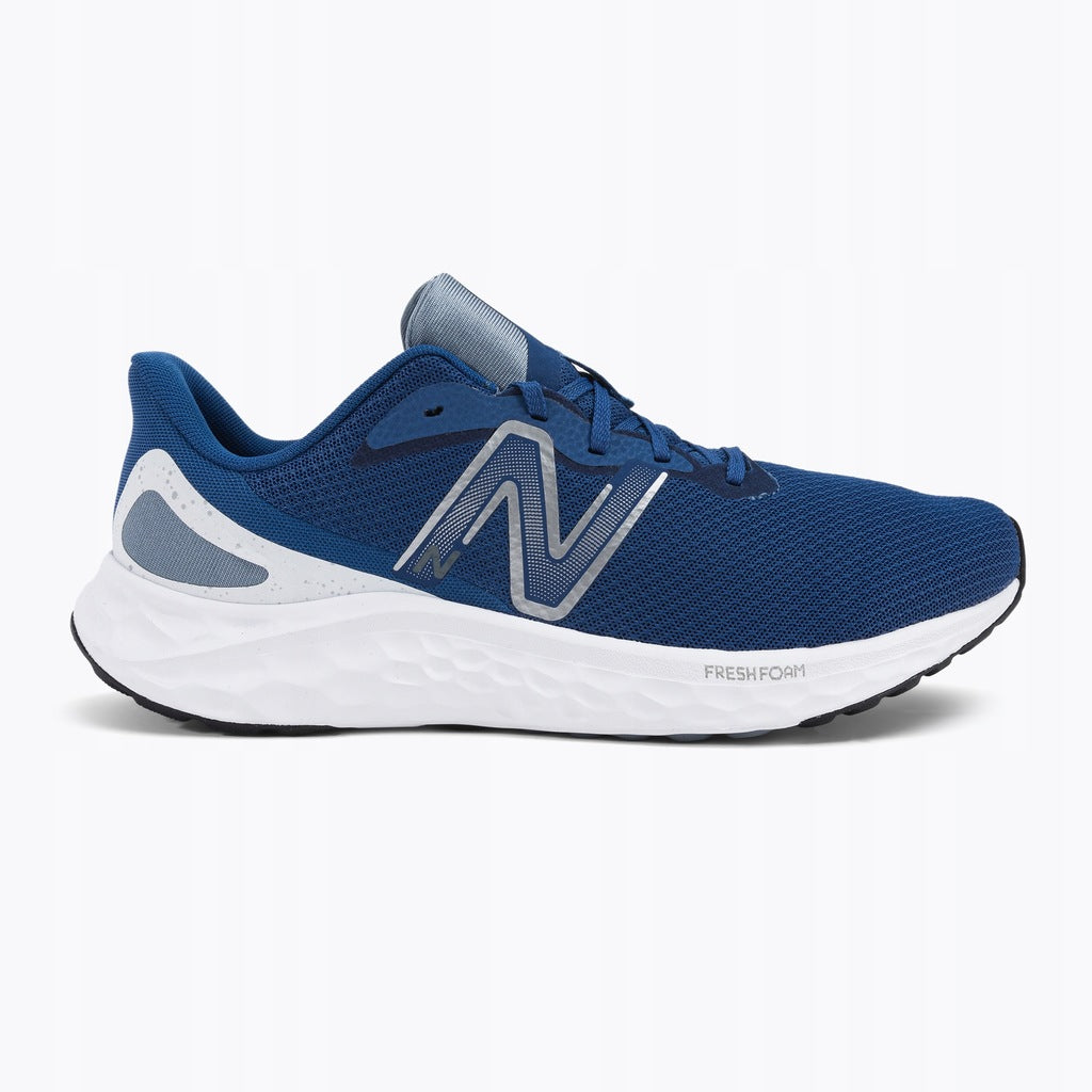 Side view on white background of Mens New Balance Fresh Foam Arishi v4 running shoe in Blue Groove/White/Silver Metallic, Medium (Regular) width