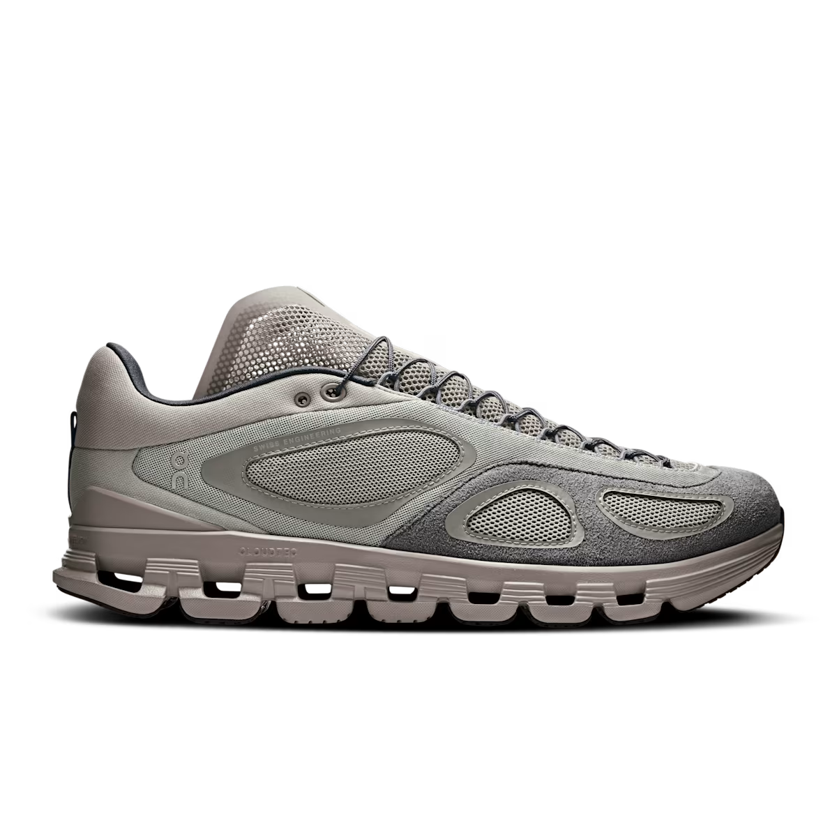 Side view on white background of Mens On Cloud X FKA running shoe in Desert, Medium (Regular) width