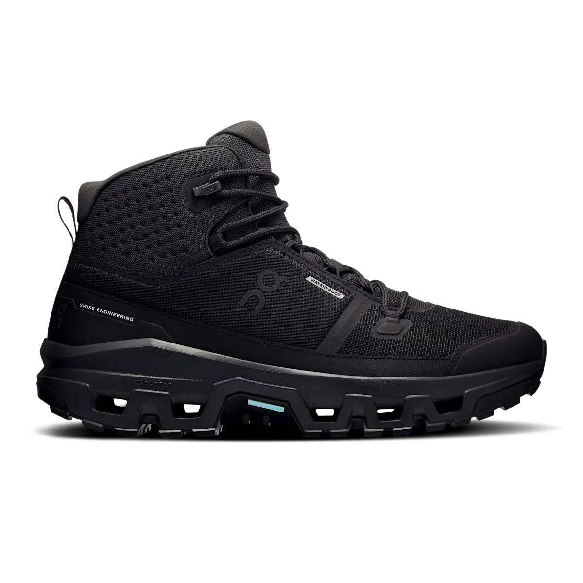 Side view on white background of Mens On Cloudrock Mid Waterproof running shoe in Black/Black, Medium (Regular) width