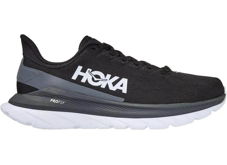 Side view on white background of Mens Hoka Mach 4 running shoe in Black/Dark Shadow, Medium (Regular) width