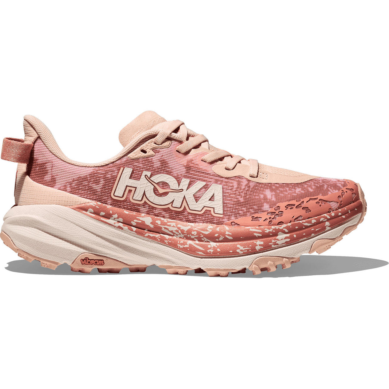 Side view on white background of Womens Hoka Speedgoat 6 running shoe in Rose Latte/Blush, Medium (Regular) width