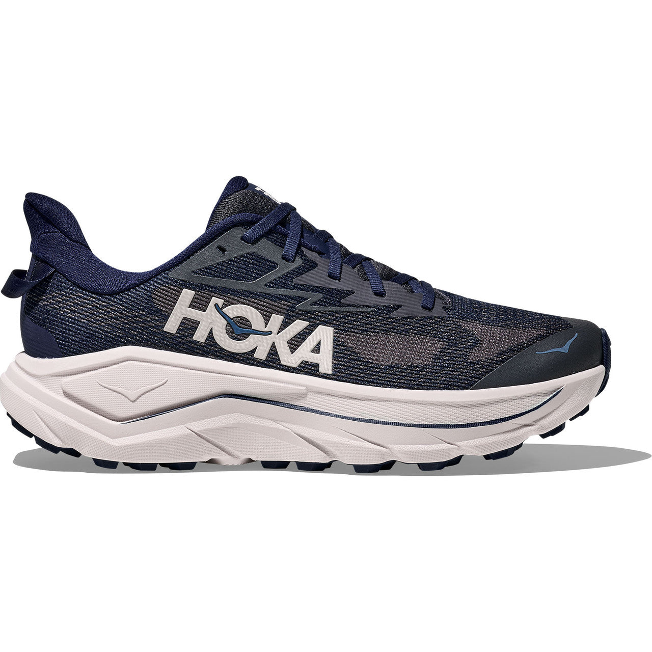 Side view on white background of Mens Hoka Challenger 8 running shoe in Midnight Blue/Grout, Wide width