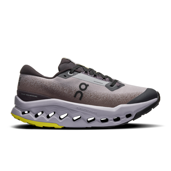 Side view on white background of Womens On Cloudsurfer Trail 2 Waterproof running shoe in Black/Lilac, Medium (Regular) width