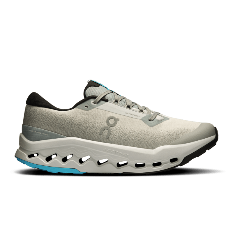 Side view on white background of Mens On Cloudsurfer Trail 2 Waterproof running shoe in Apollo/Glacier, Medium (Regular) width