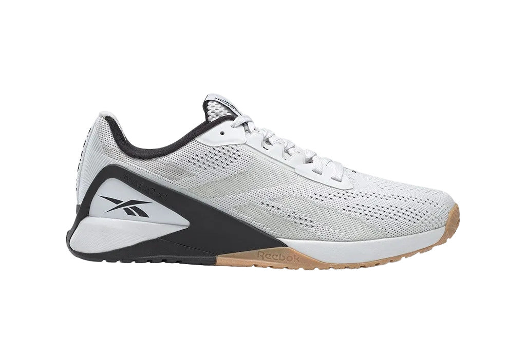 Side view on white background of Mens Reebok Nano X1 running shoe in White/Black/Rubber Gum, Medium (Regular) width