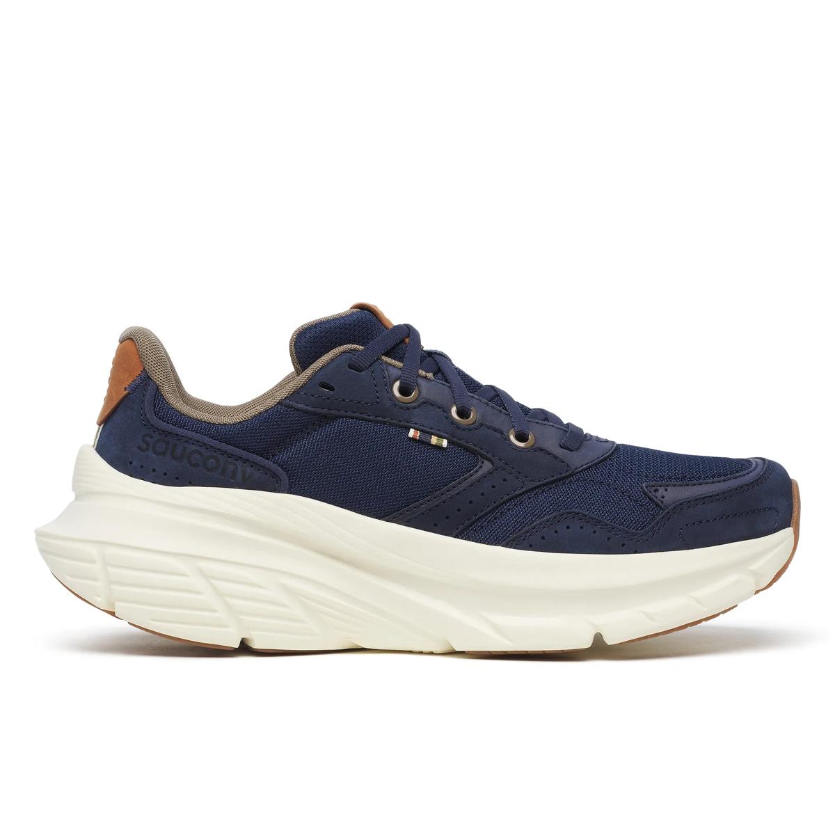Side view on white background of Womens Saucony Guide Metro running shoe in Navy, Medium (Regular) width