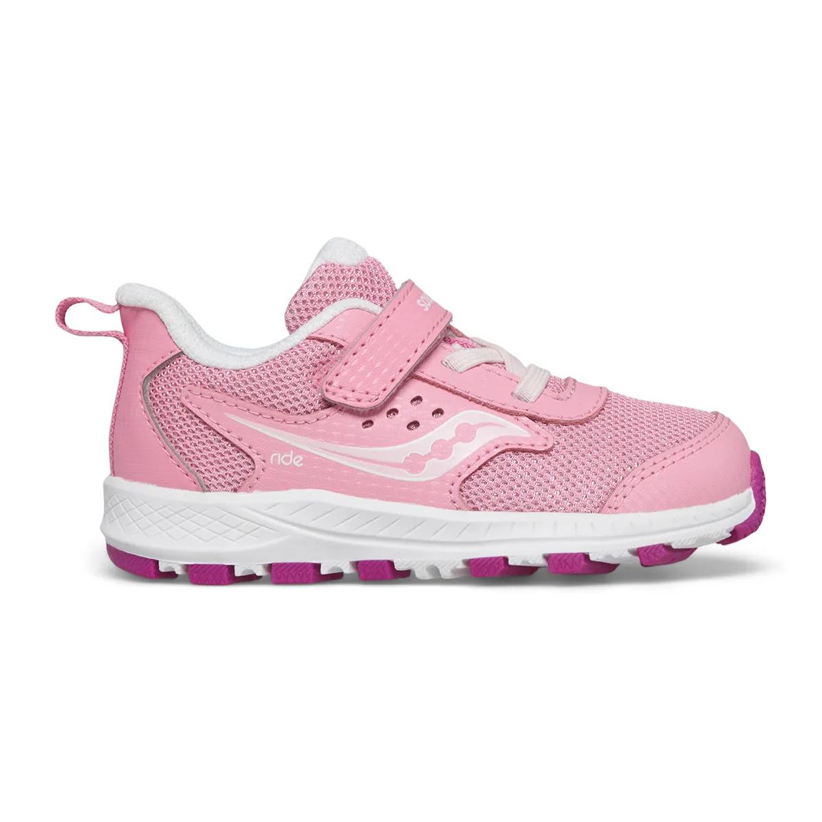 Side view on white background of Toddler Saucony Ride JR running shoe in Pink, Medium (Regular) width