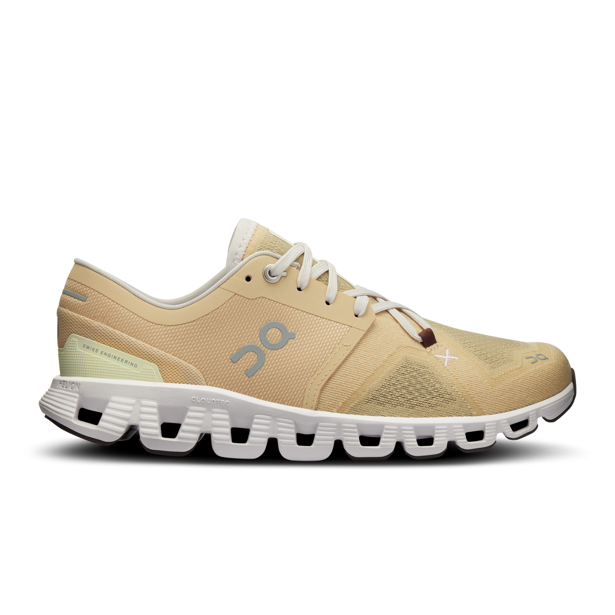 Side view on white background of Womens On Cloud X 3 running shoe in Savannah/Frost, Medium (Regular) width