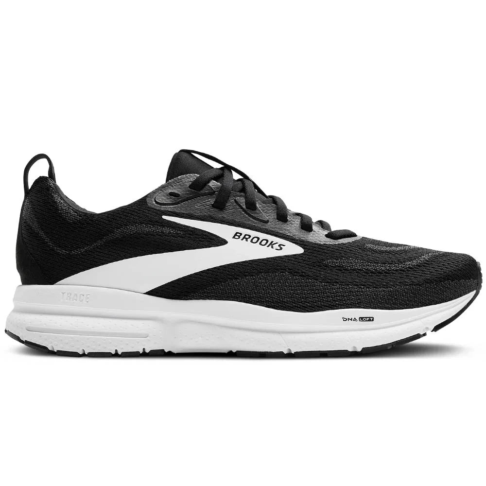 Side view on white background of Womens Brooks Trace running shoe in Black/Grey/White, Wide width