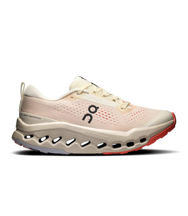 Side view on white background of Womens On Cloudsurfer Trail 2 running shoe in Ivory/Salmon, Medium (Regular) width