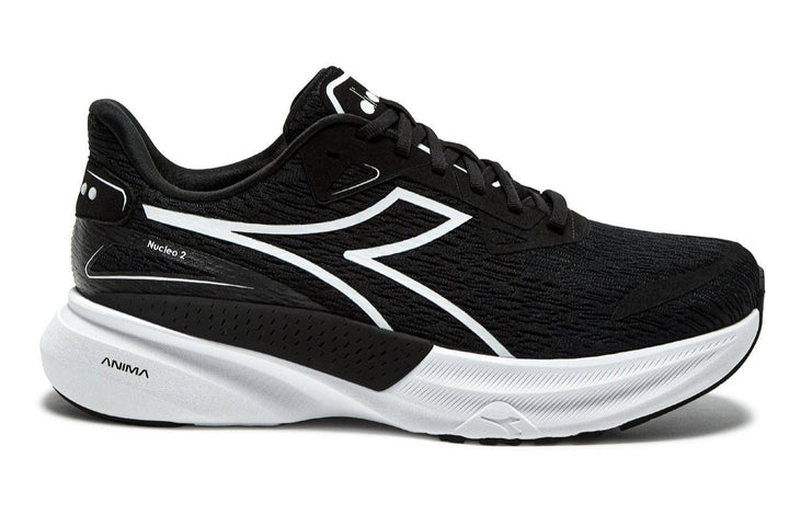 Side view on white background of Womens Diadora Nucleo 2 running shoe in Black/White, Medium (Regular) width