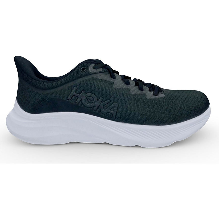 Side view on white background of Womens Hoka Solimar running shoe in Black/White, Wide width