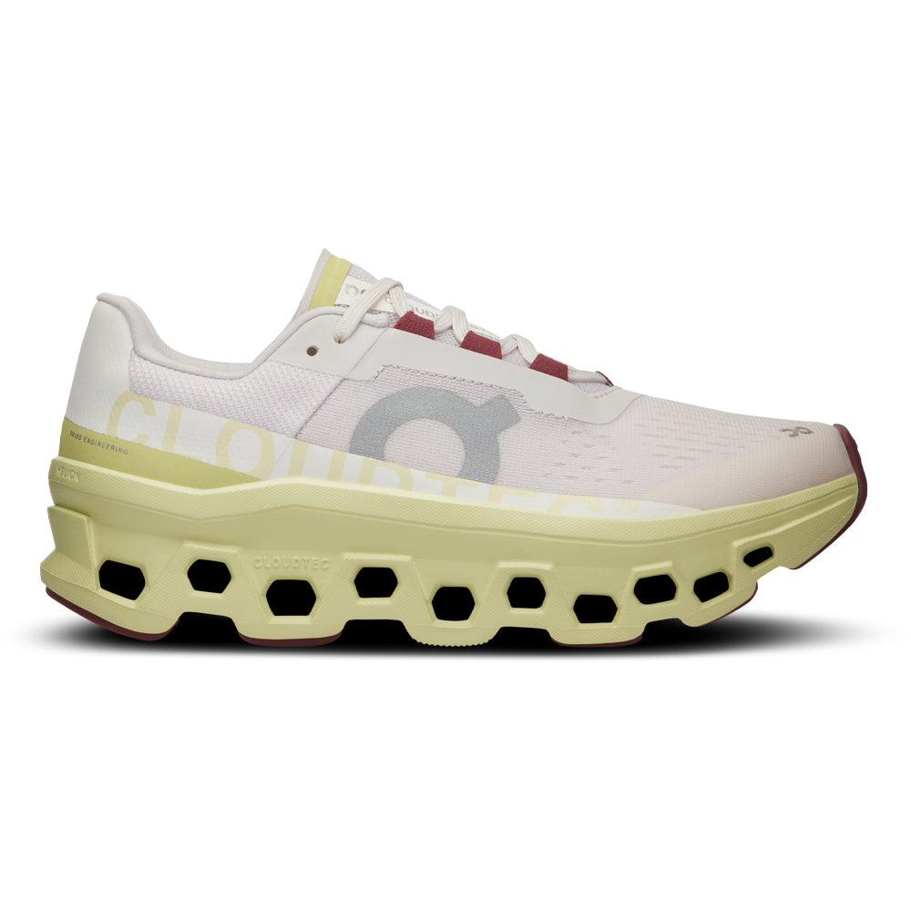 Side view on white background of Womens On Cloudmonster running shoe in Frost/Acacia, Medium (Regular) width