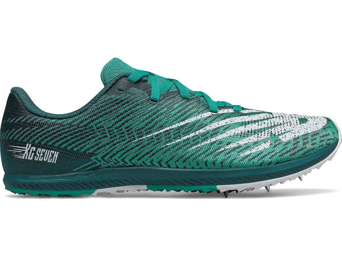 Side view on white background of Womens New Balance XC Seven V2 running shoe in Tidepool/Verdite, Medium (Regular) width